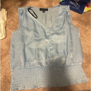 Blue silk women’s blouse with buttons
